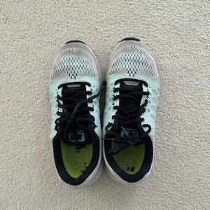 Well worn ladies sneakers